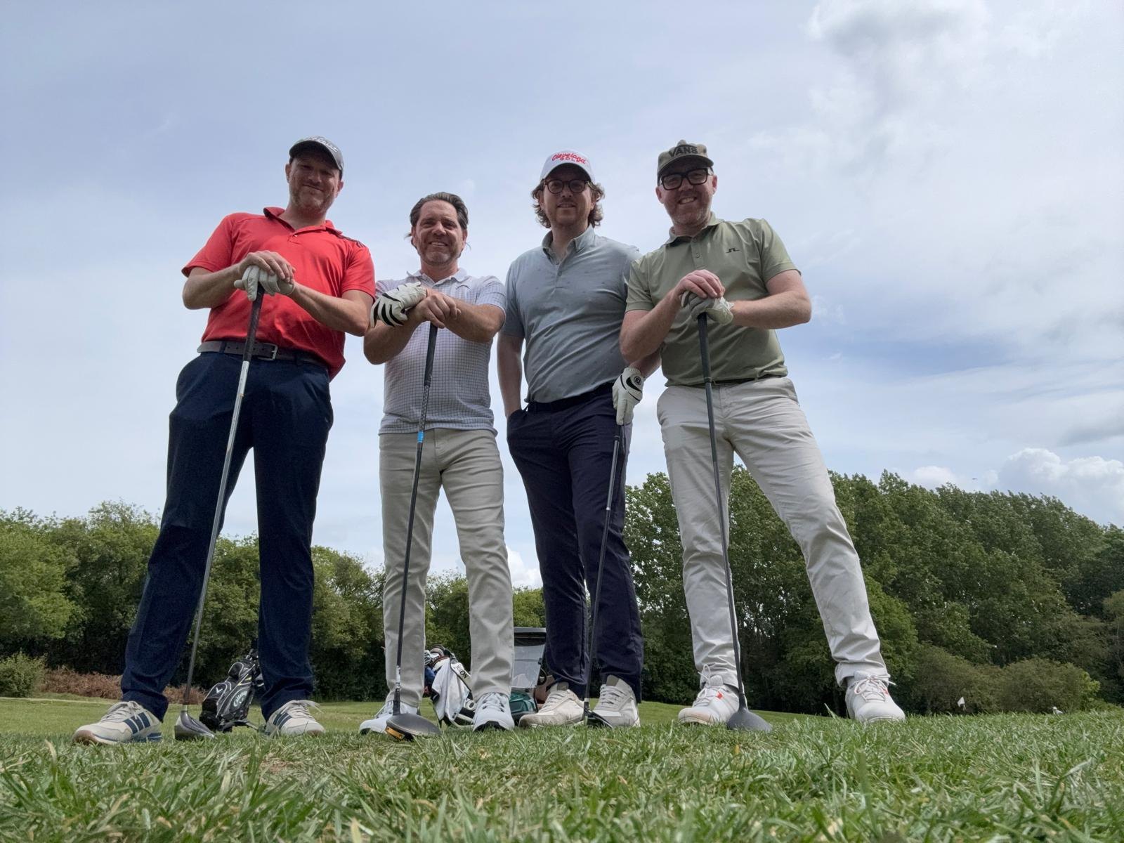 Redwood golf group standing on a course